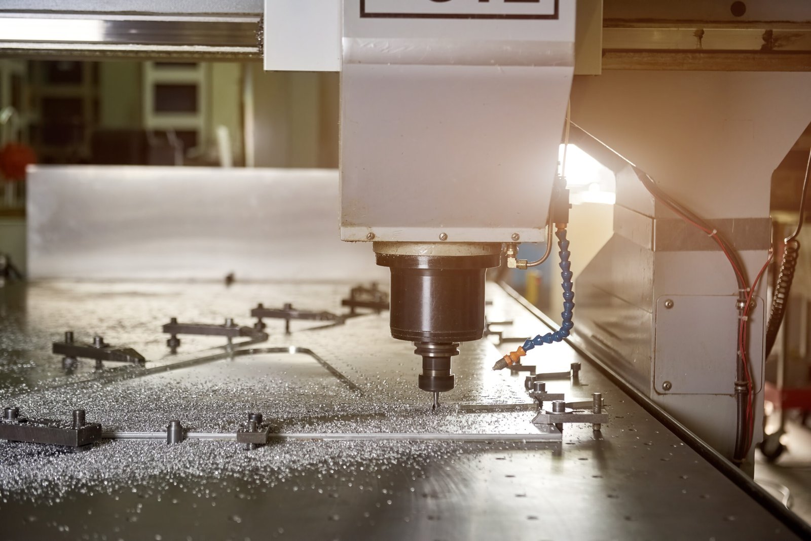 Cnc machine drilling metal. Drill and stainless steel.